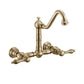 Vintage III Plus Wall Mount Faucet with a Long Traditional Swivel Spout, Lever Handles and Solid Brass Side Spray, Antique Brass, WHKWLV3-9402-NT-AB